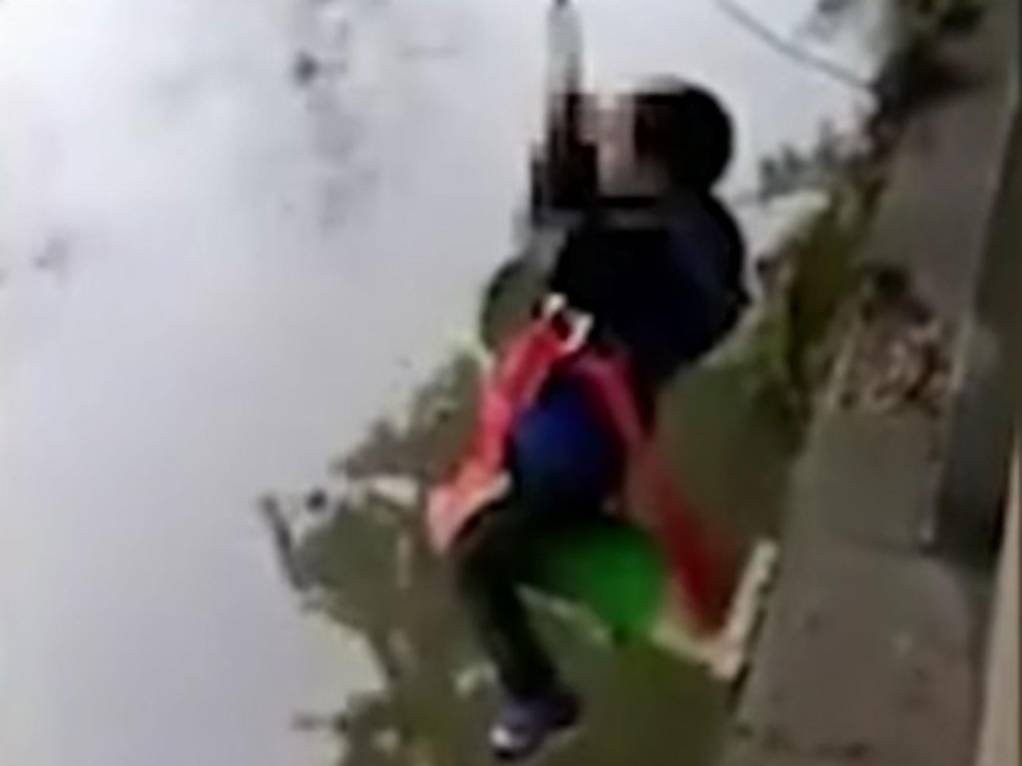 Father dangles son over river while shouting maths questions The Independent The Independent image