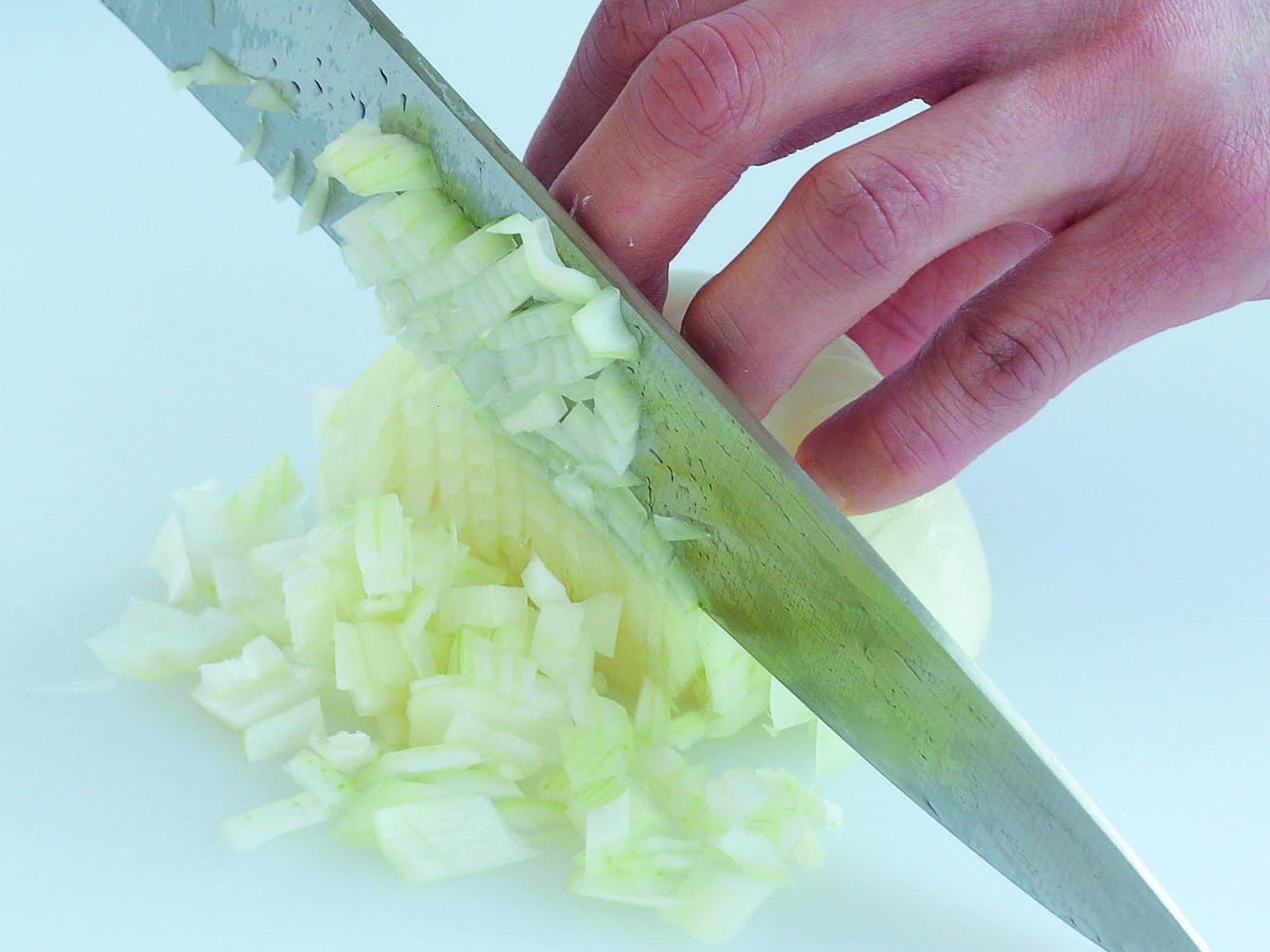 3. Now move the onion so that the root end is on your left and proceed as for slicing an onion. It may be a little more difficult, but try to hold the onion together in your other hand ‘claw’ to protect your fingertips and fingernails