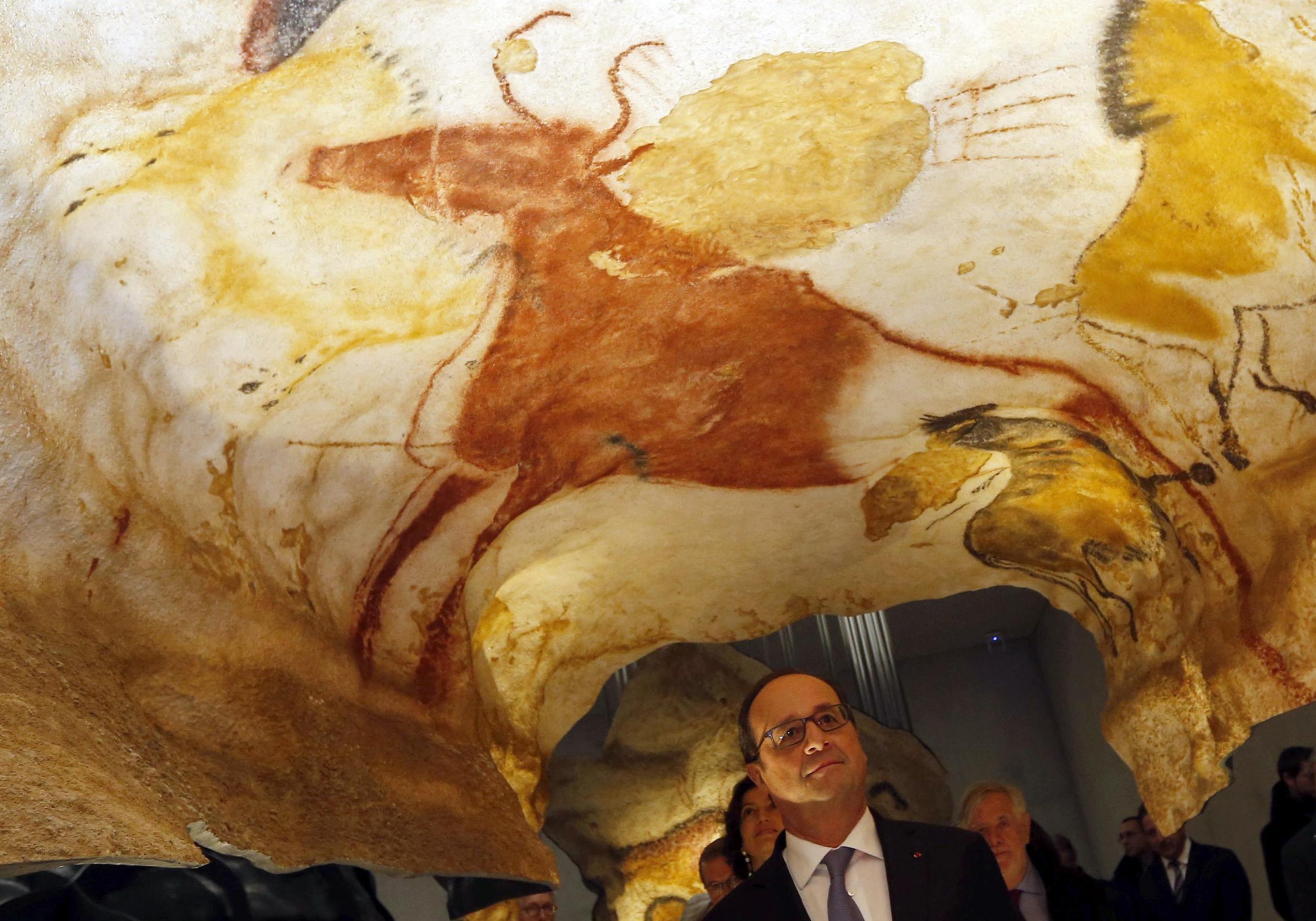 Lascaux (replica shown here, visited by French President François Hollande) was closed down entirely after its prehistoric cave paintings were destroyed by tourists