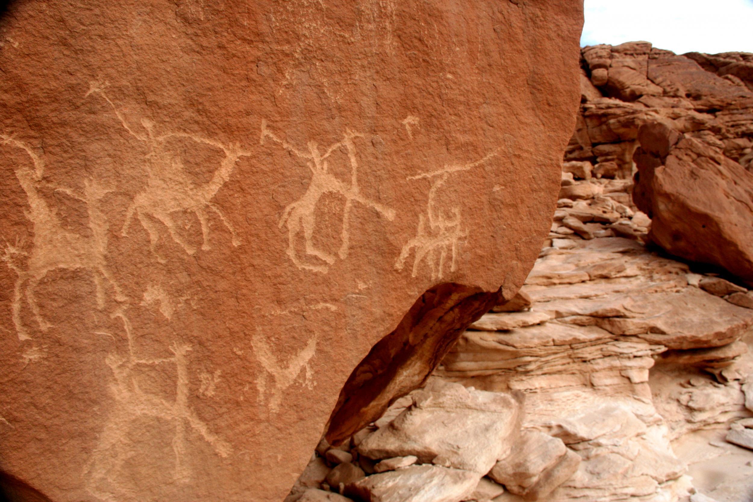 &#13;
Petroglyphs record a tribal skirmish near Jebel Mileihis &#13;