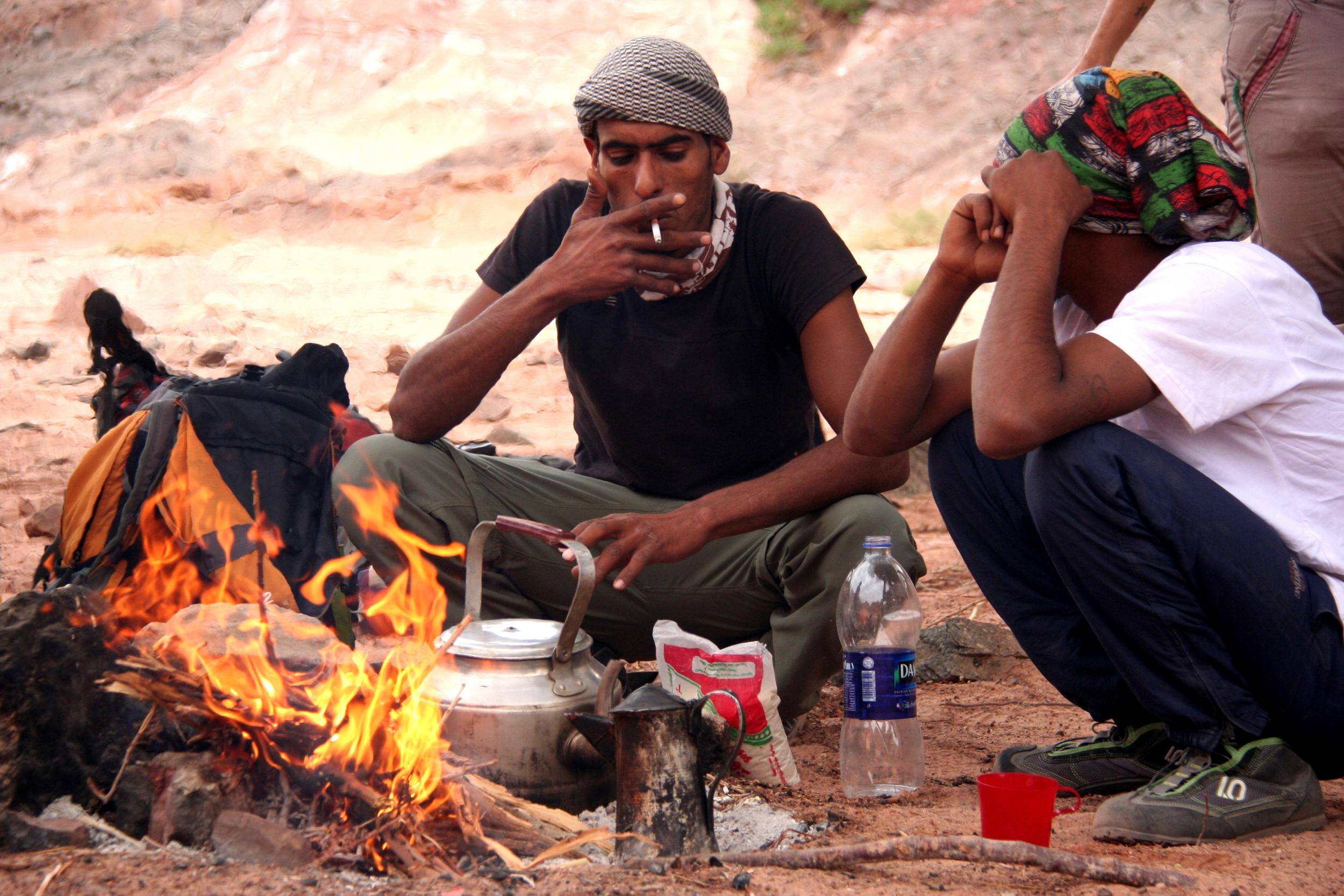 &#13;
Surefooted Jordanians Mohamed and Mohamed rest up with sweet tea and cigarettes &#13;