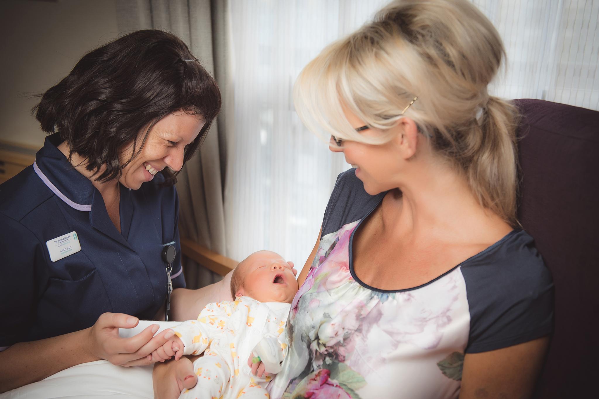 A midwife and new mother and baby at The Portland