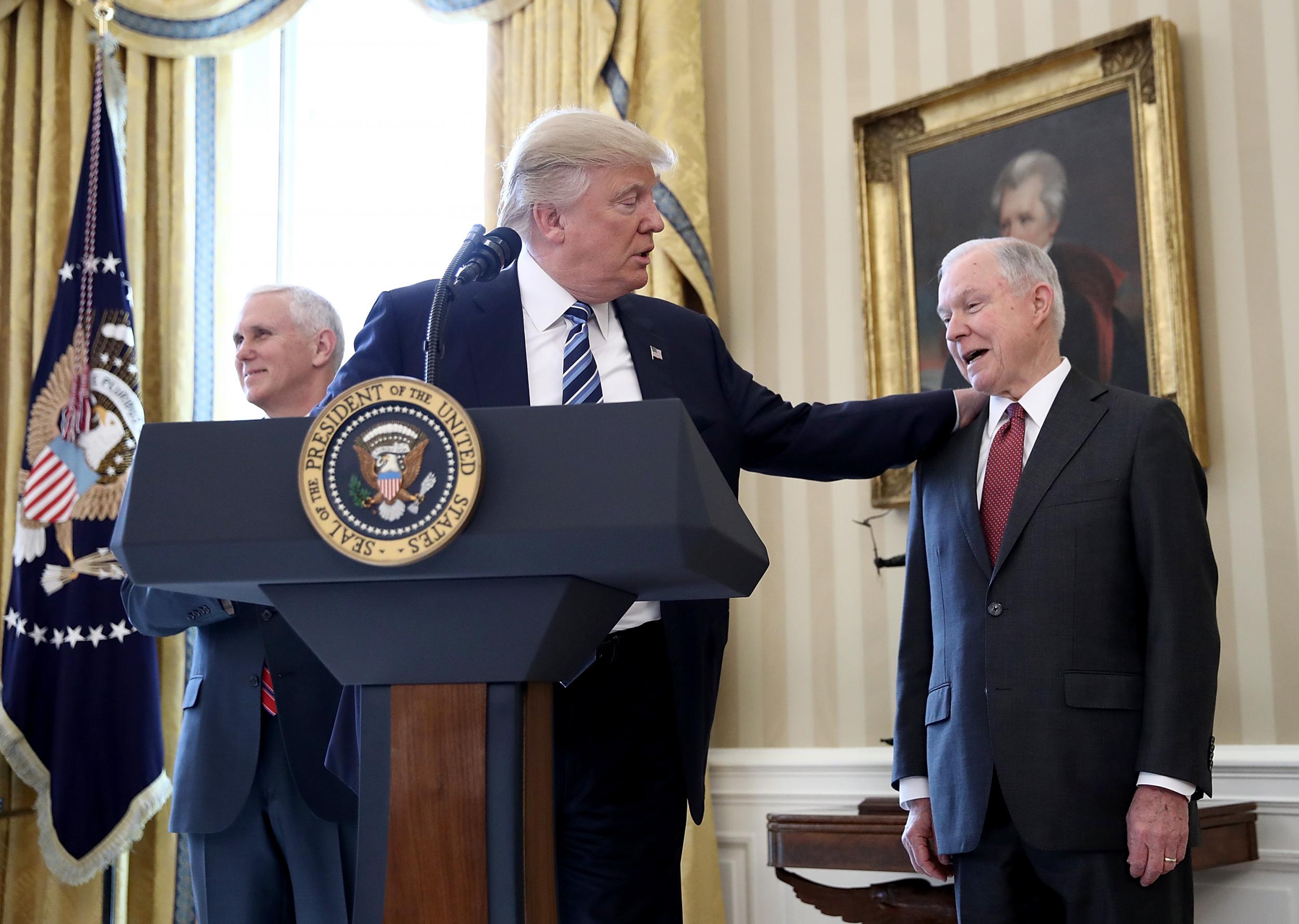 Donald Trump with Jeff Sessions before the US Attorney General’s swearing in ceremony last month