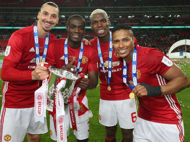 Antonio Valencia (right) believes Manchester United can add the FA Cup and Europa League trophies