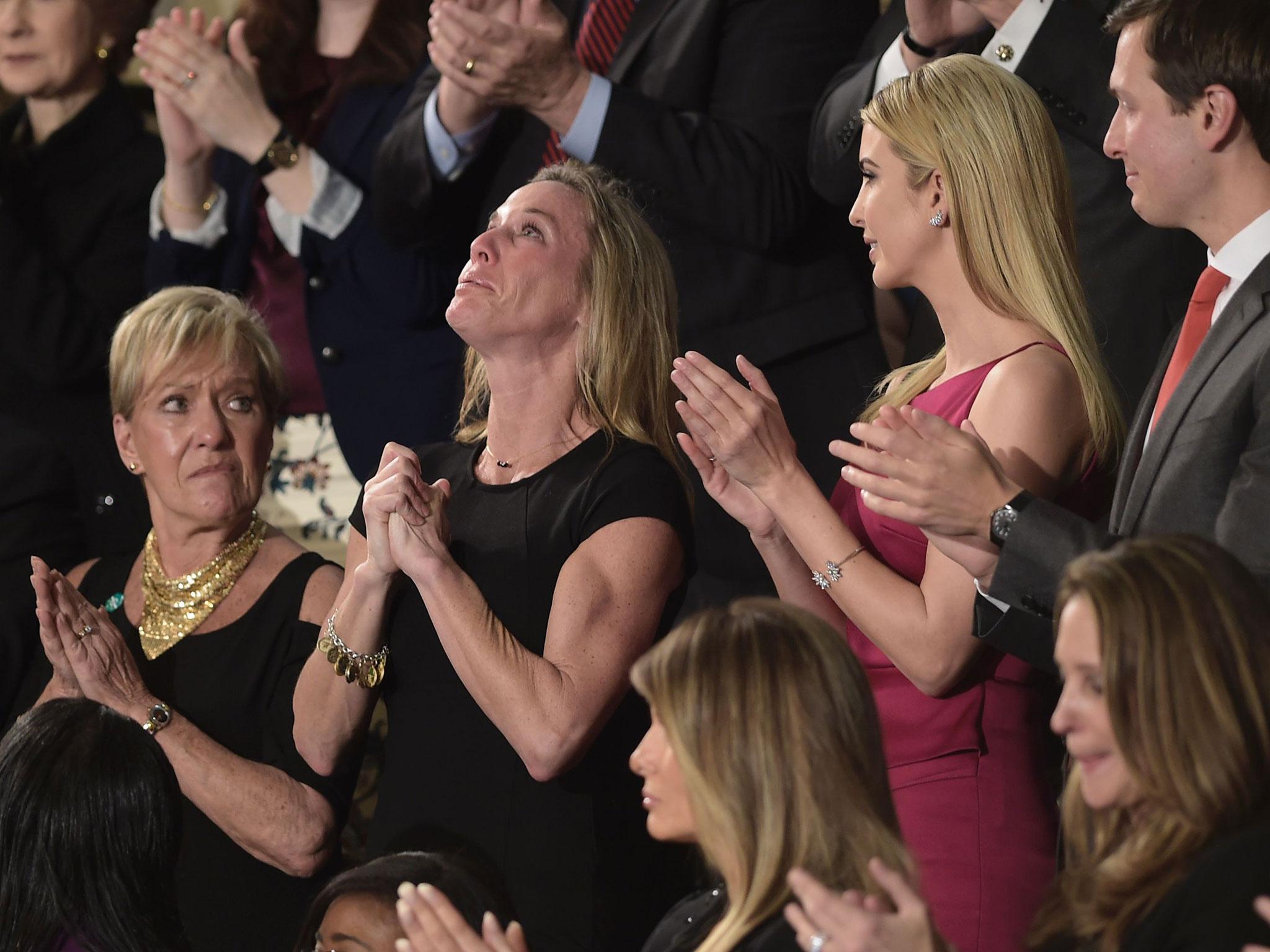 Carryn Owens, wife of Navy SEAL William 'Ryan' Owens, was a guest as US President Donald Trump recognised Mr Owens at a joint session of the US Congress
