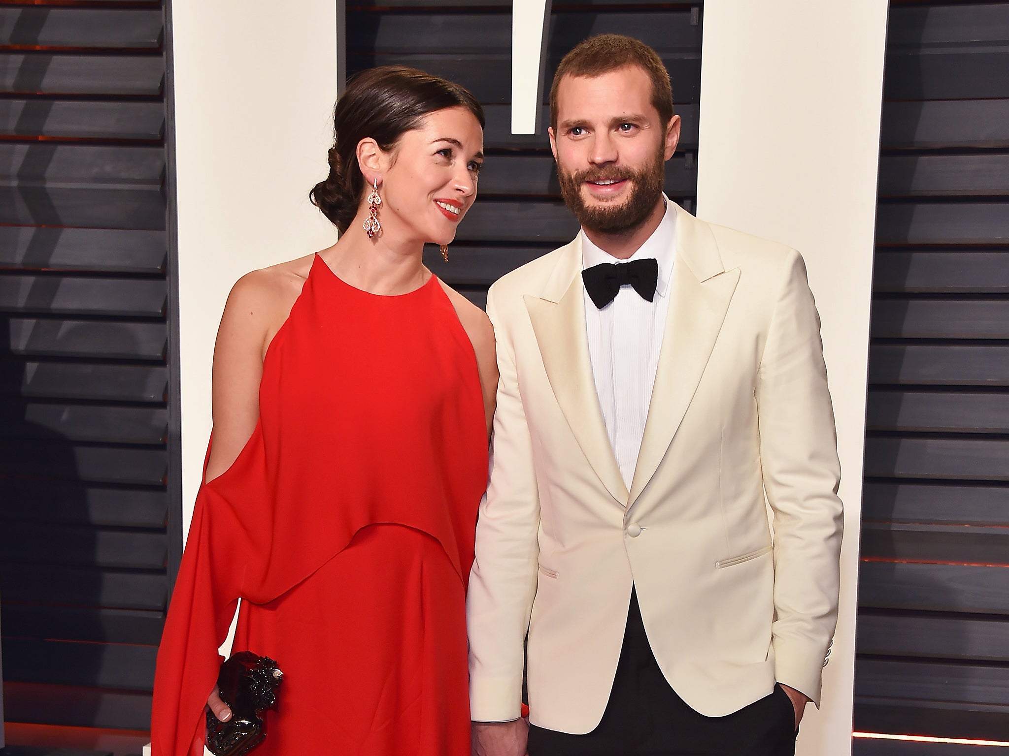 Warner and her husband Jamie Dornan attend the 2017 Vanity Fair Oscar Party hosted by Graydon Carter at Wallis Annenberg Center for the Performing Arts in Beverly Hills, California (Getty)