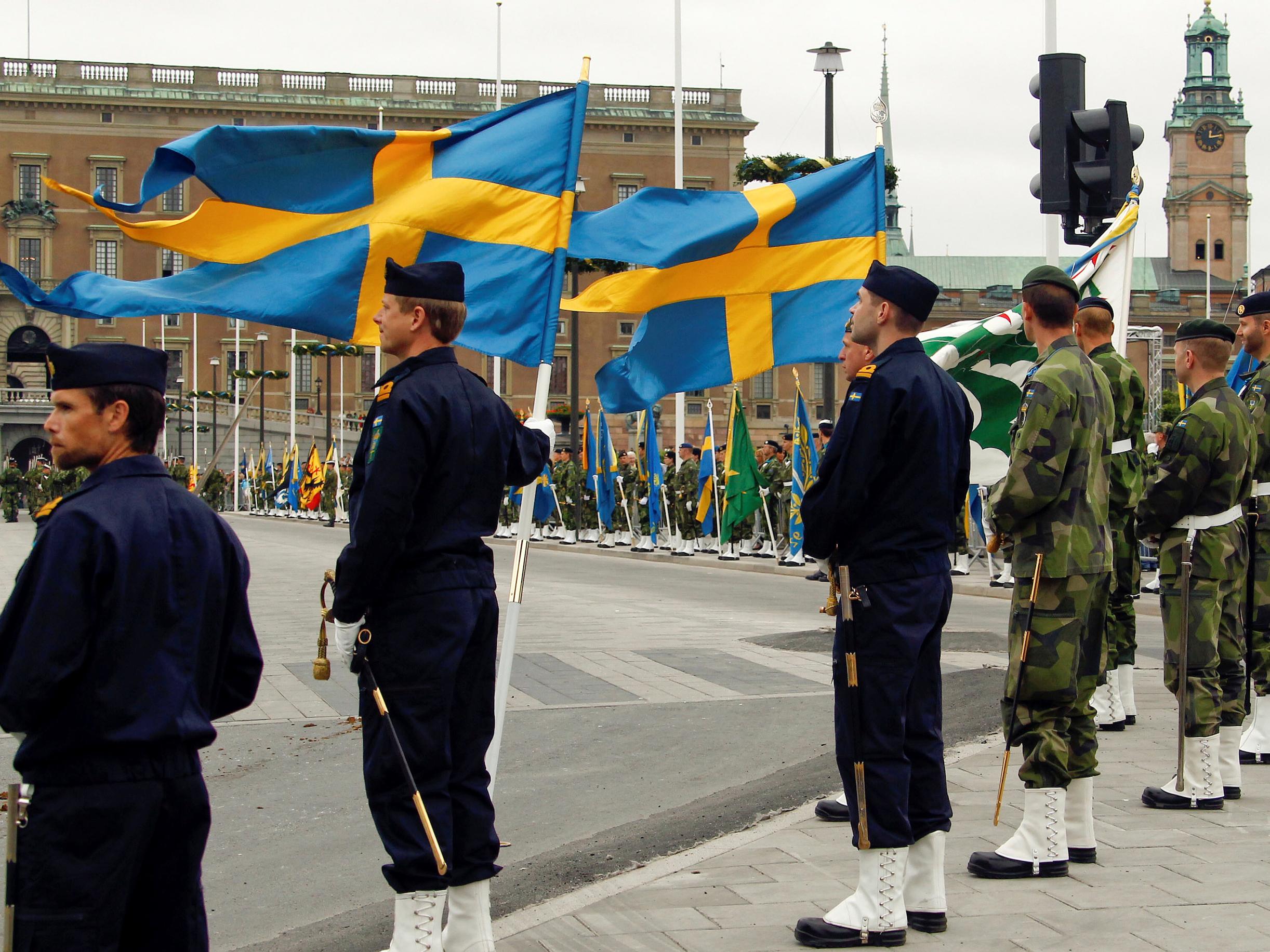 Swedish armed forces soldiers attend a rehearsal in front of the Royal Palace in Stockholm