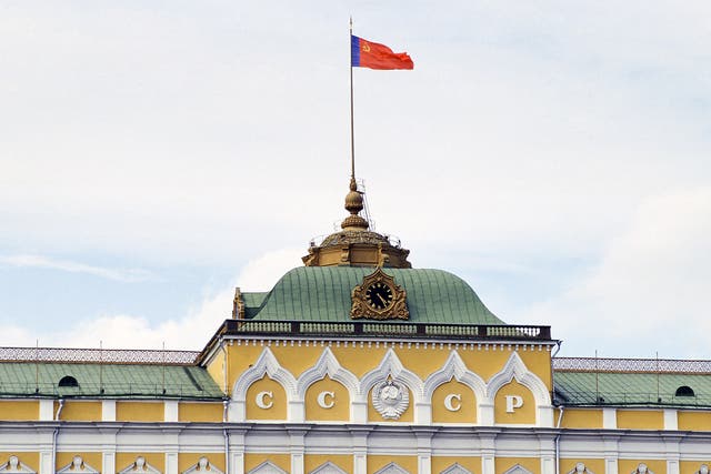 Hammer and Sickle flag flying over The Kremlin, Russia