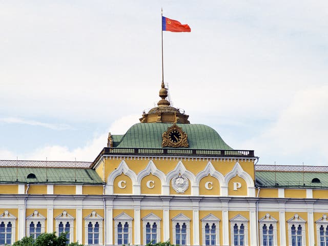 Hammer and Sickle flag flying over The Kremlin, Russia