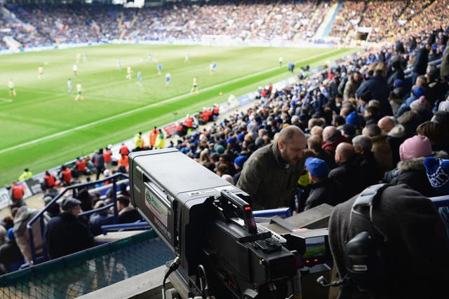 <p>A camera takes in a Premier League game, broadcasting it live around the world</p>