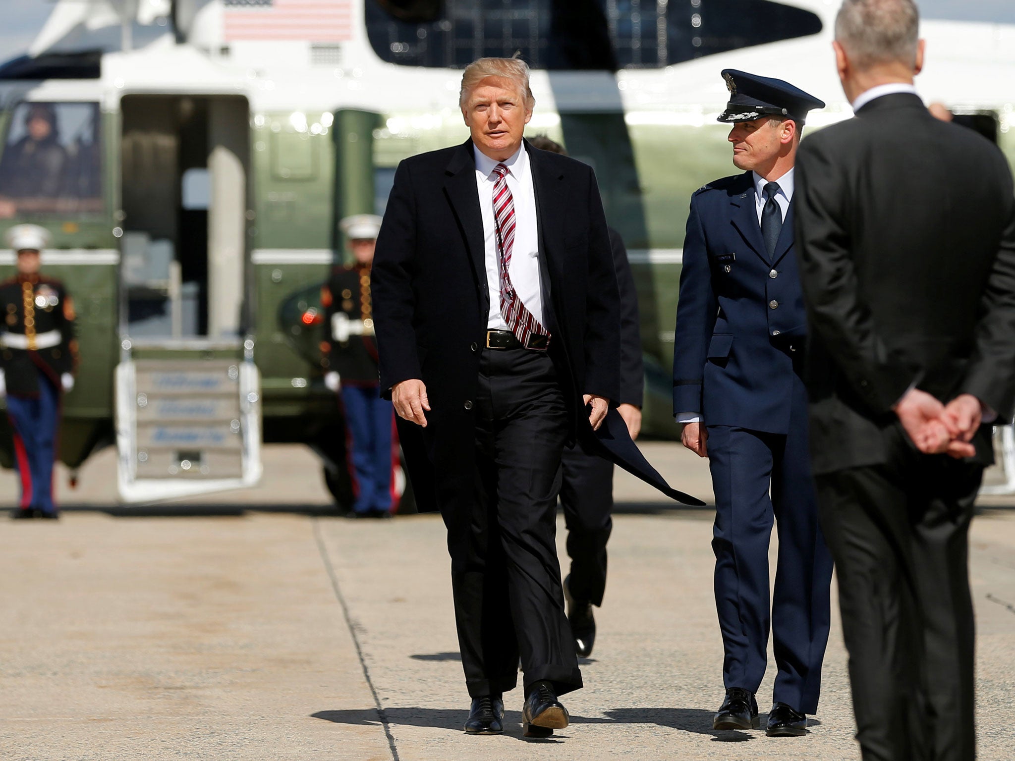 President Donald Trump arrives to board Air Force One at Joint Base Andrews in Maryland