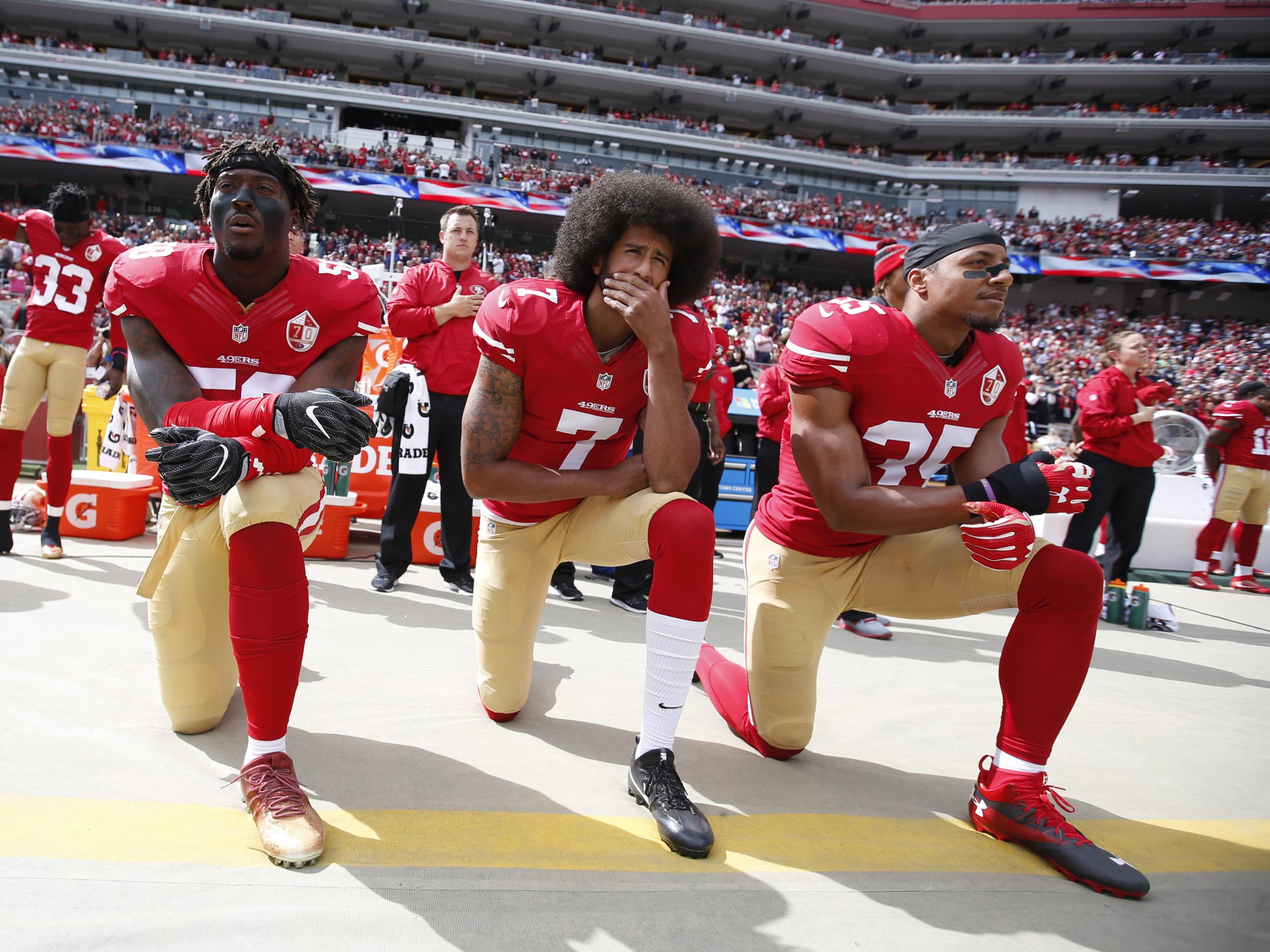 Colin Kaepernick alters stance and will now stand during the national  anthem, The Independent