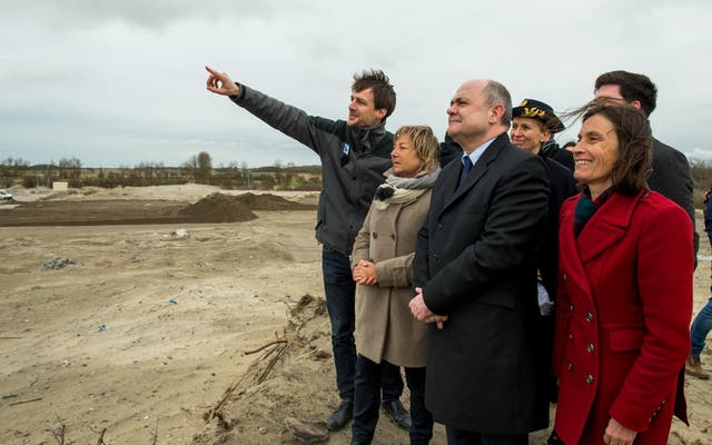 French interior minister Bruno Le Roux with Calais Mayor Natacha Bouchart [L]