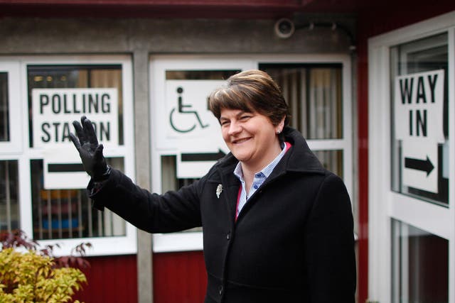 Democratic Unionist Party leader Arlene Foster arrives to cast her vote at a polling station in Brookeborough, Northern Ireland
