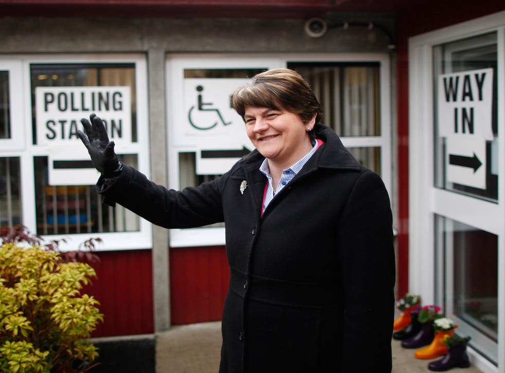 Democratic Unionist Party leader Arlene Foster arrives to cast her vote at a polling station in Brookeborough, Northern Ireland