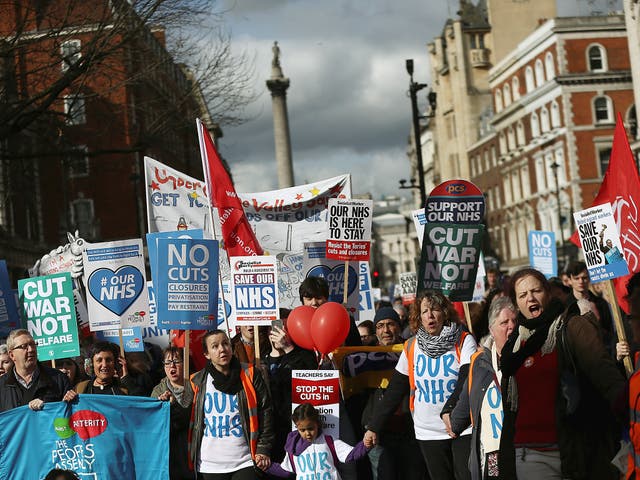 Demonstrators on the thousands-strong march to protest NHS cuts and privatisation 