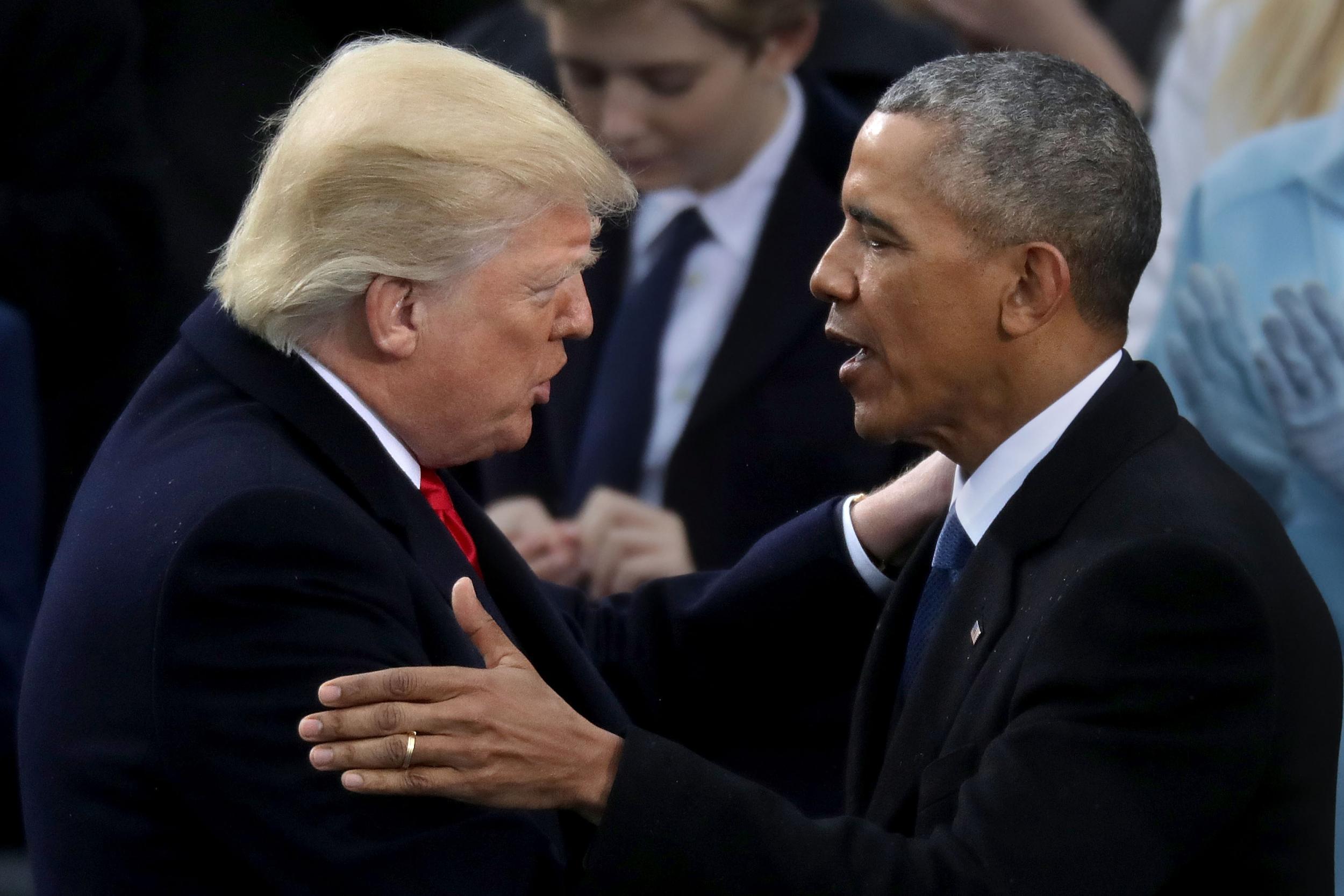 Barack Obama congratulates Donald Trump as the latter takes the oath of office in January