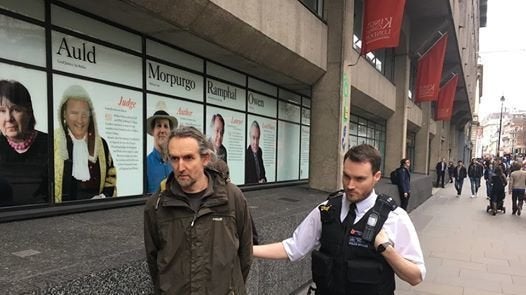 Roger Hallam, who has been on hunger strike for 11 days, being arrested following a peaceful protest outside the university