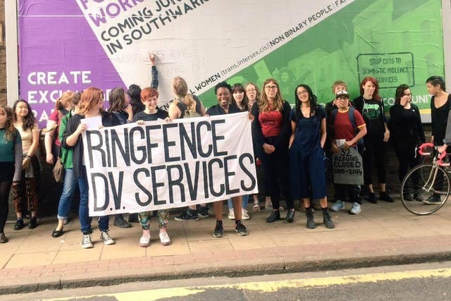 Members of domestic violence campaign group Sisters Uncut have been protesting cuts to refuge services