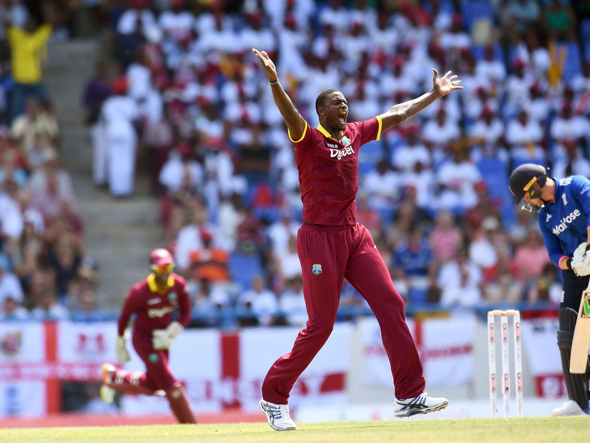 West Indies cricket team captaIn Jason Holder unsuccessfully appeals for a dismissal against Roy