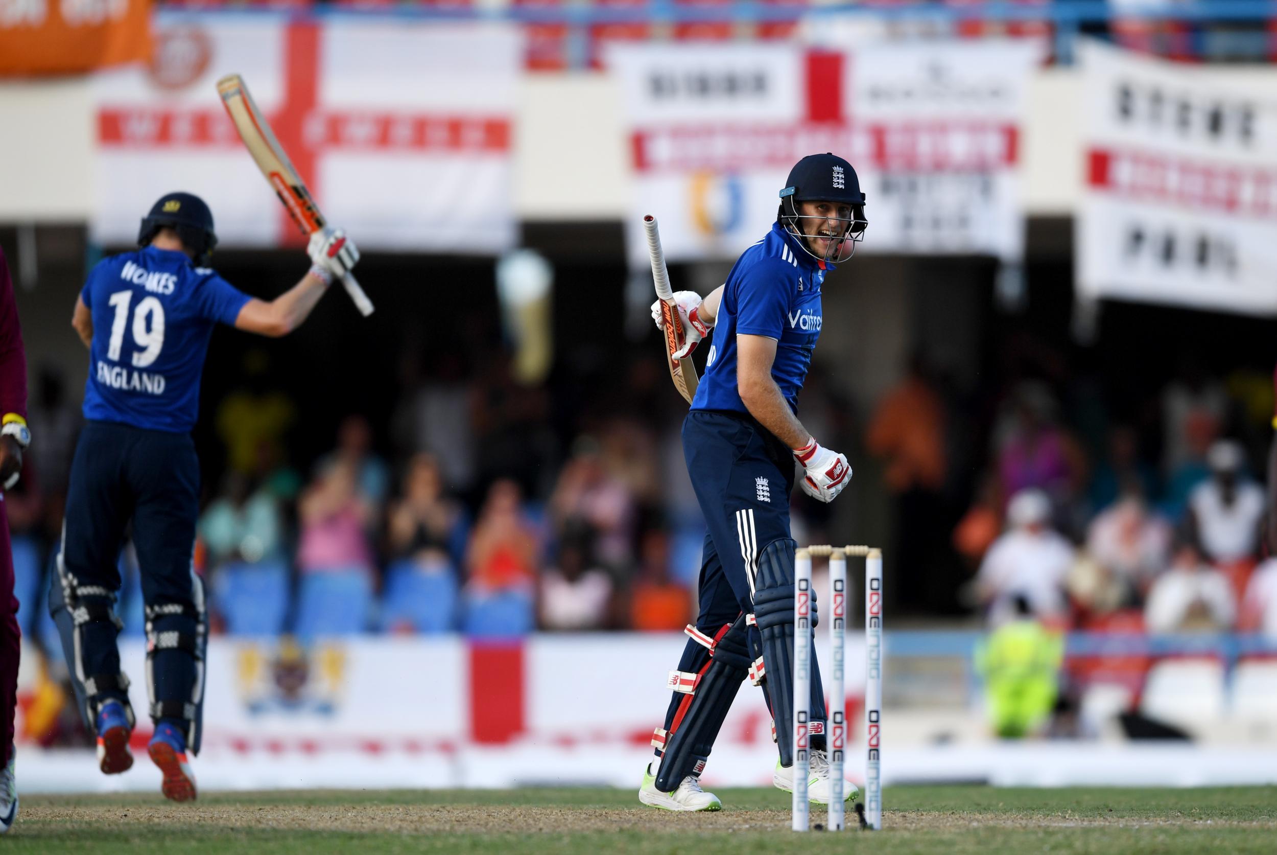 Joe Root celebrates after securing victory with England