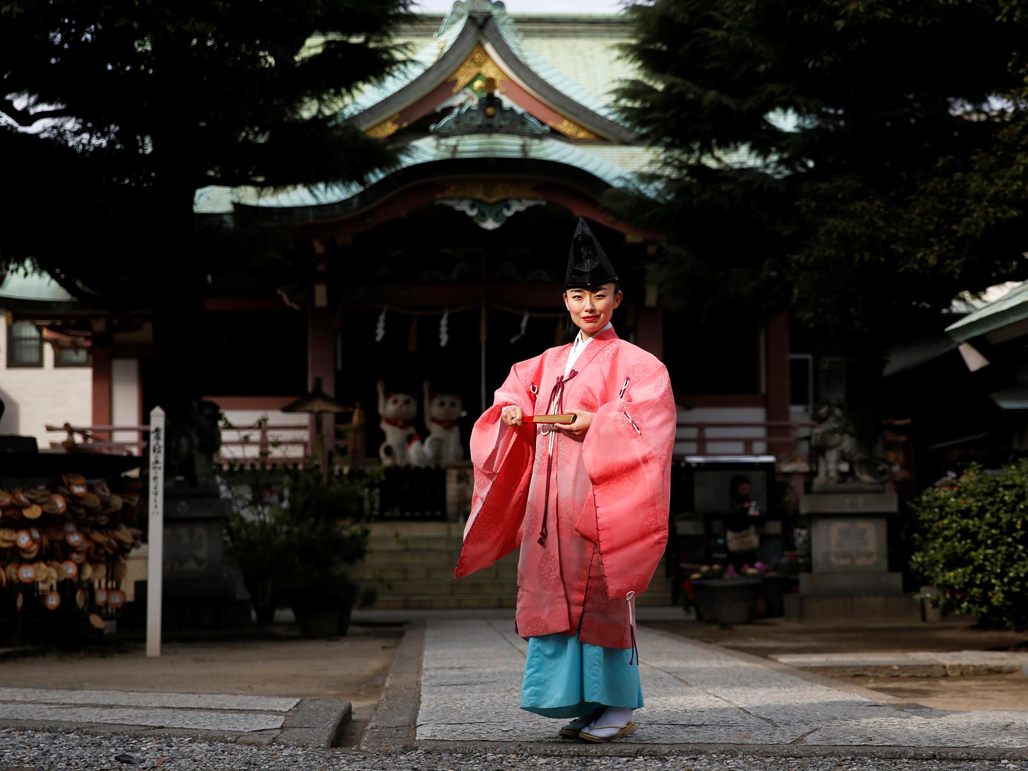 Shinto priest Tomoe Ichino: 'I decided to be proud of the fact that I am a female priest and I began wearing a pink robe, like today'