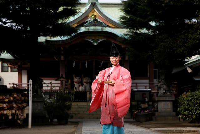 Shinto priest Tomoe Ichino:  'I decided to be proud of the fact that I am a female priest and I began wearing a pink robe, like today'