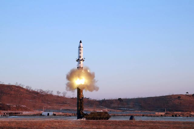 A view of the test-fire of Pukguksong-2 guided by North Korean leader Kim Jong Un on the spot, in this undated photo released by North Korea's Korean Central News Agency (KCNA) in Pyongyang February 13, 2017.