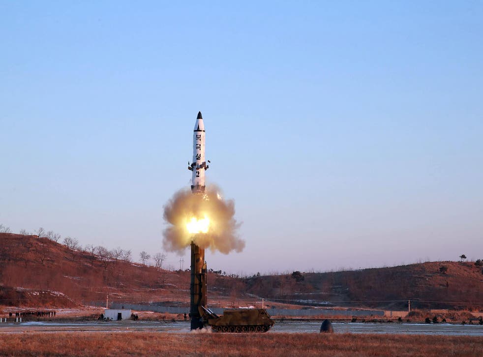A view of the test-fire of Pukguksong-2 guided by North Korean leader Kim Jong Un on the spot, in this undated photo released by North Korea's Korean Central News Agency (KCNA) in Pyongyang February 13, 2017.