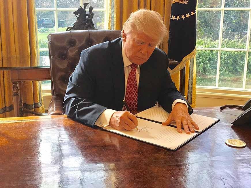 Donald Trump signed the new executive order after the first was blocked by the courts