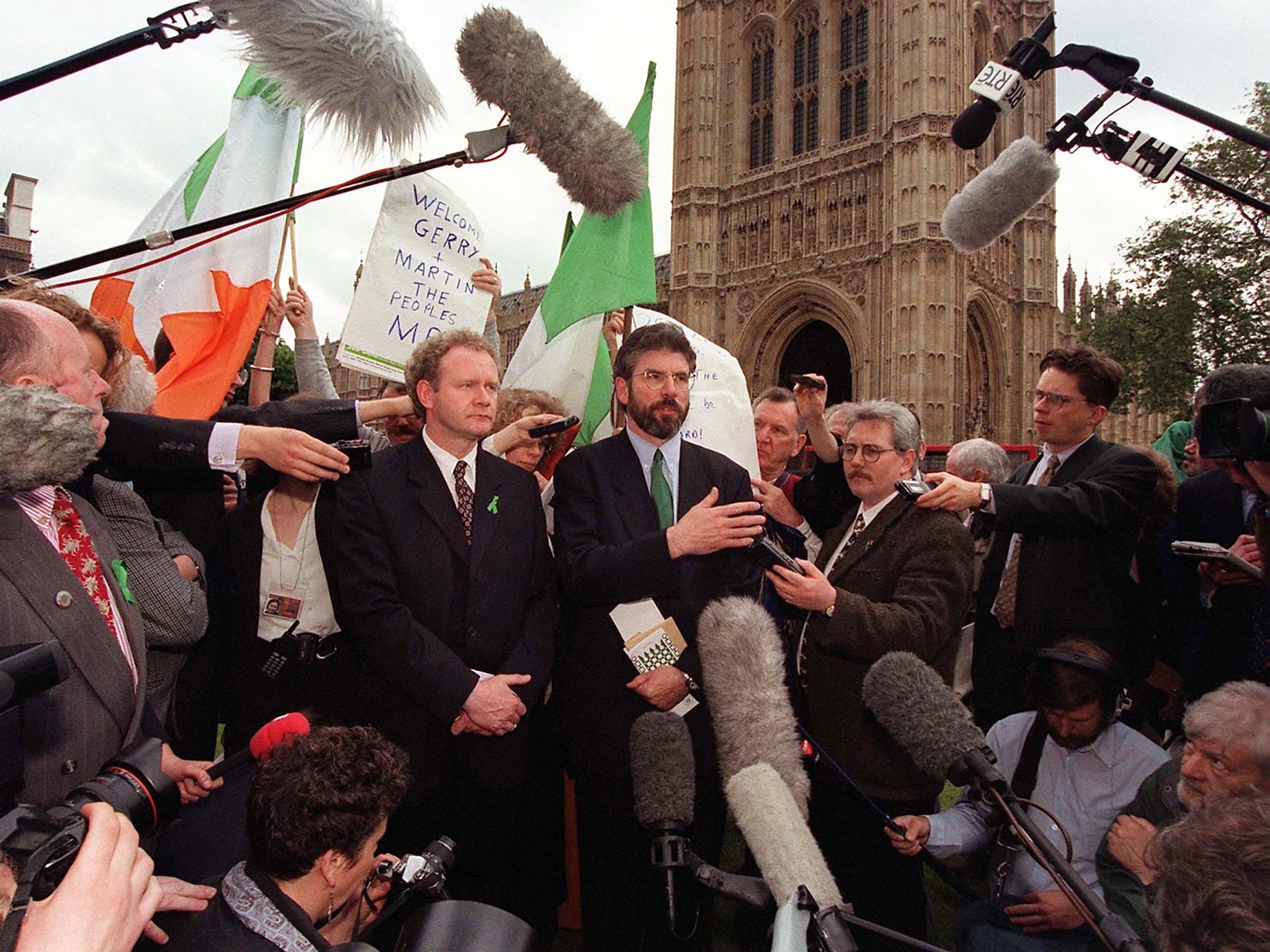 Newly elected Sinn Fein MPs McGuinness and Adams in May 1997 after challenging an order barring them from Parliament for refusing to swear allegiance to the Queen