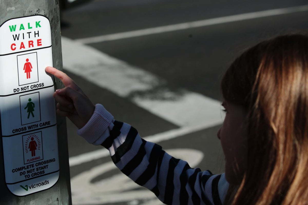 Female figures put on pedestrian crossing signs to fight 'unconscious ...