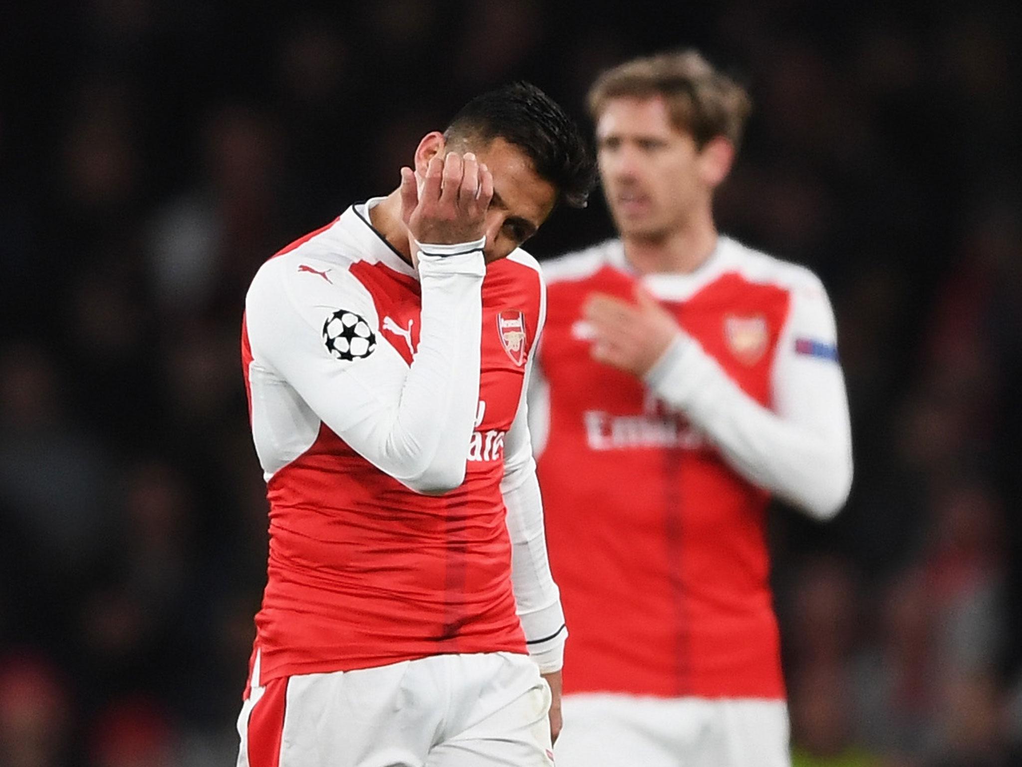 Alexis Sanchez looks on dejected as Arsenal lose to Bayern
