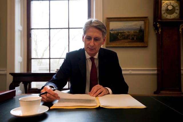 Chancellor Philip Hammond prepares his speech in his office at the Treasury ahead of his 2017 budget annoucement