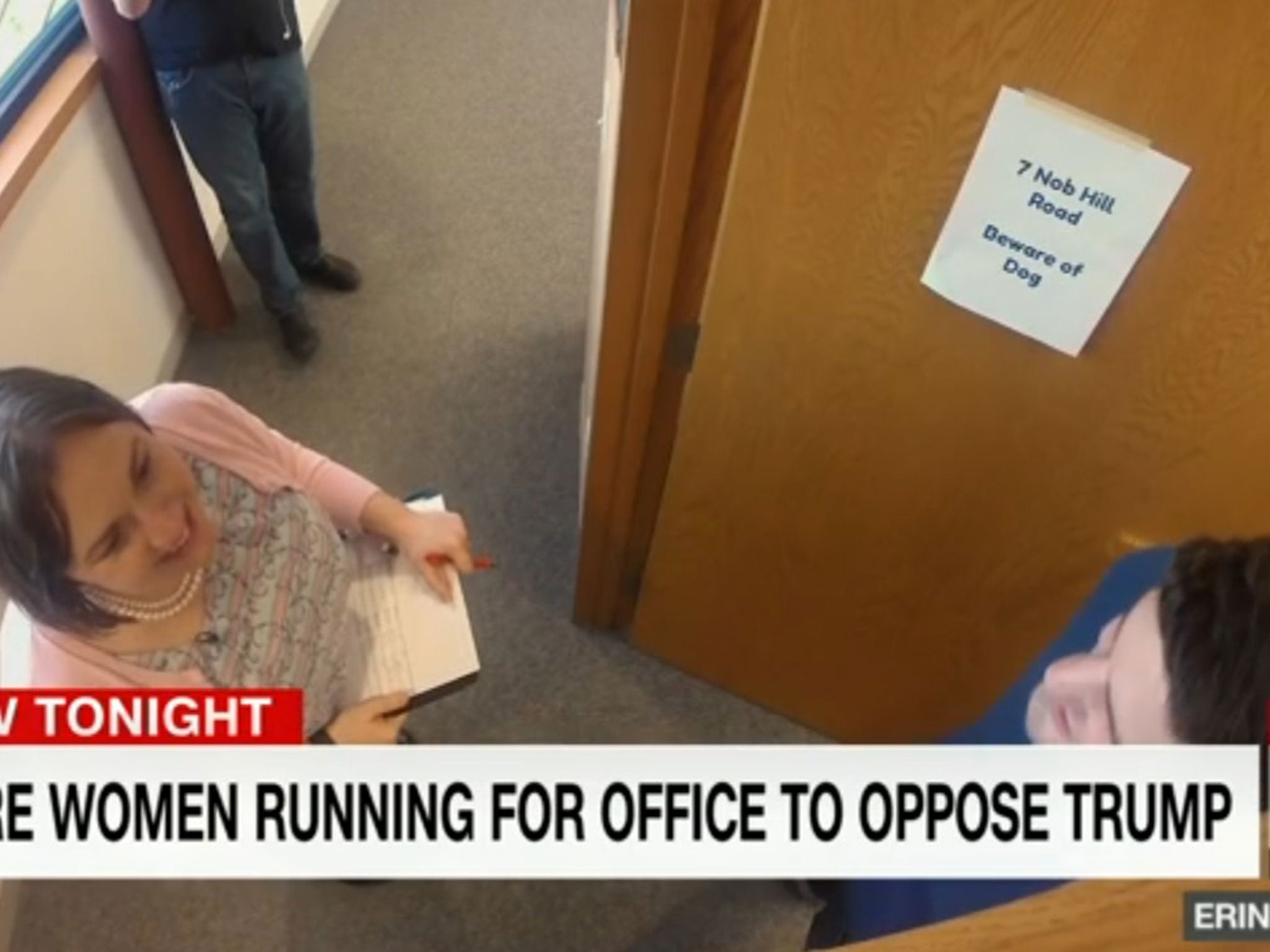 A woman practises her door-knocking skills on the Emerge Wisconsin programme, as seen on CNN