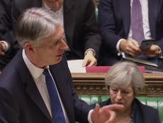 Theresa May interrupts Hammond's Budget to remind him it's Women's Day