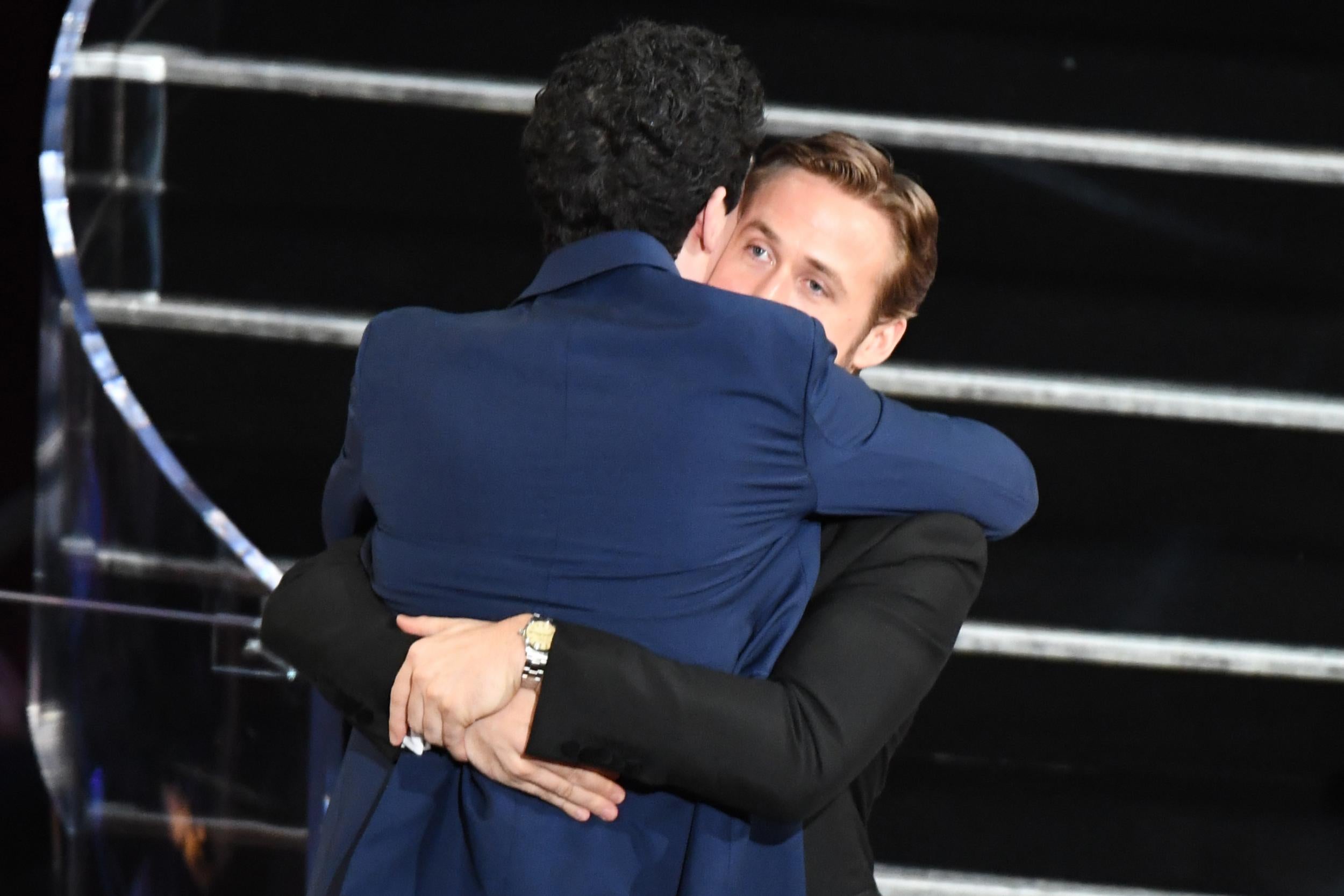 A hug between ‘La La Land’ colleagues Damien Chazelle (left) and Ryan Gosling