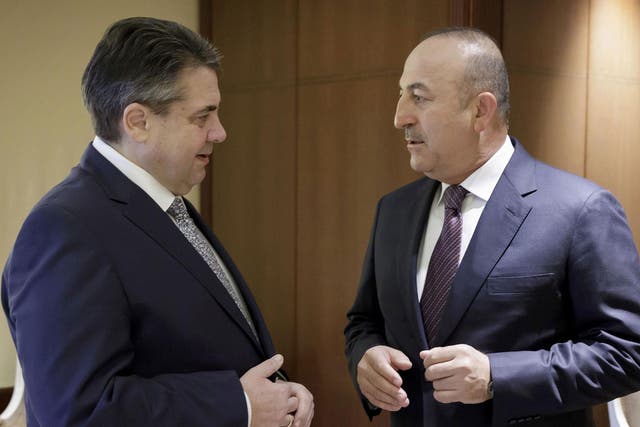 German foreign minister Sigmar Gabriel meets his Turkish counterpart Mevlut Cavusoglu at the Adlon hotel in Berlin, Germany