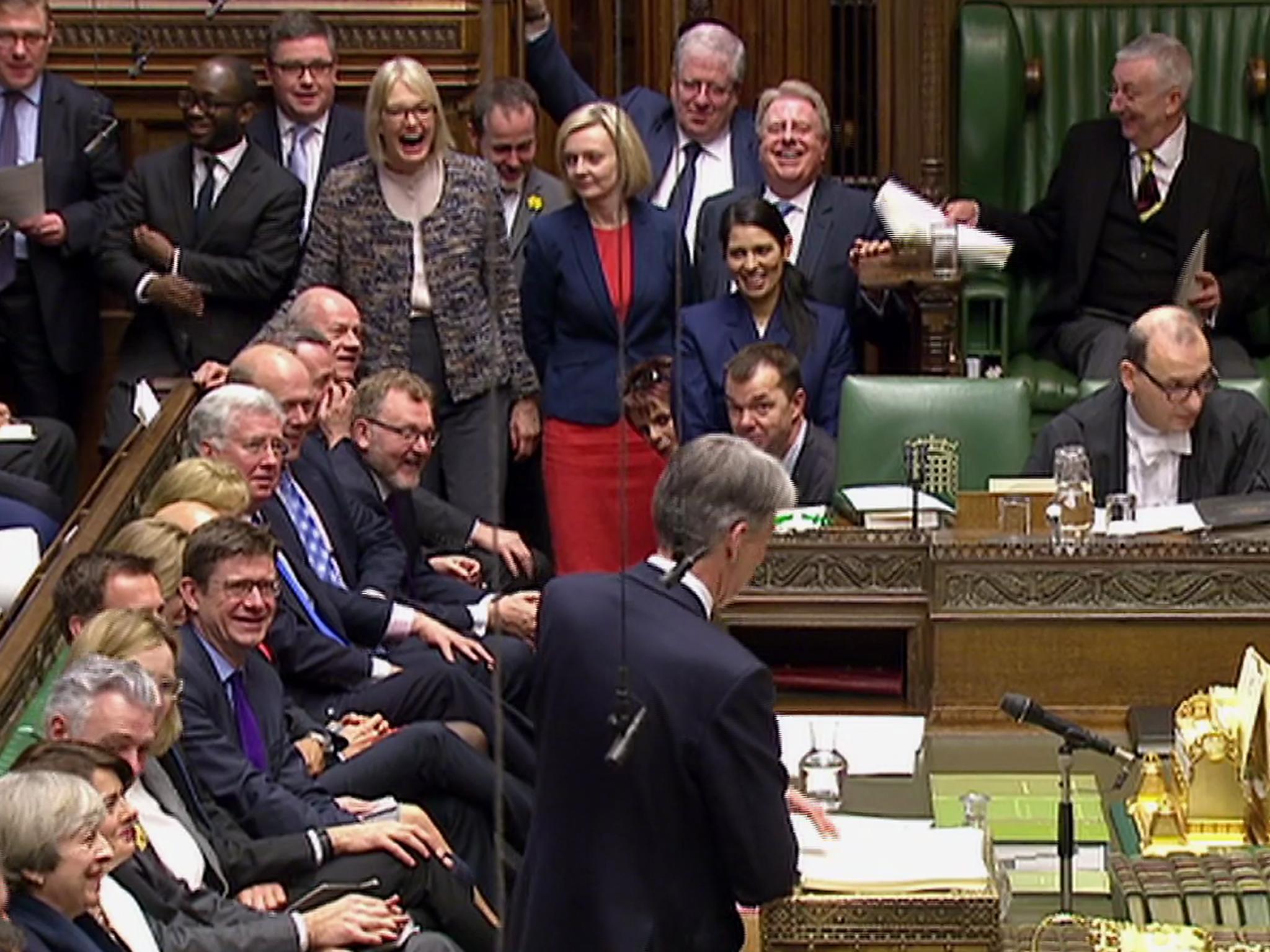 Philip Hammond delivering his budget speech with a few laughs