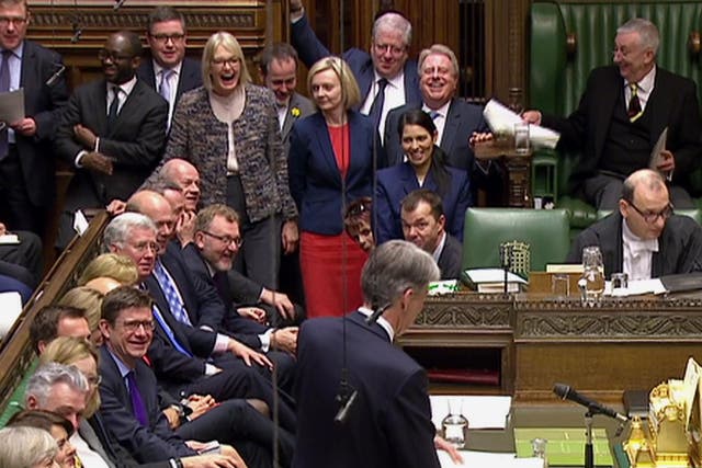 Philip Hammond delivering his budget speech with a few laughs