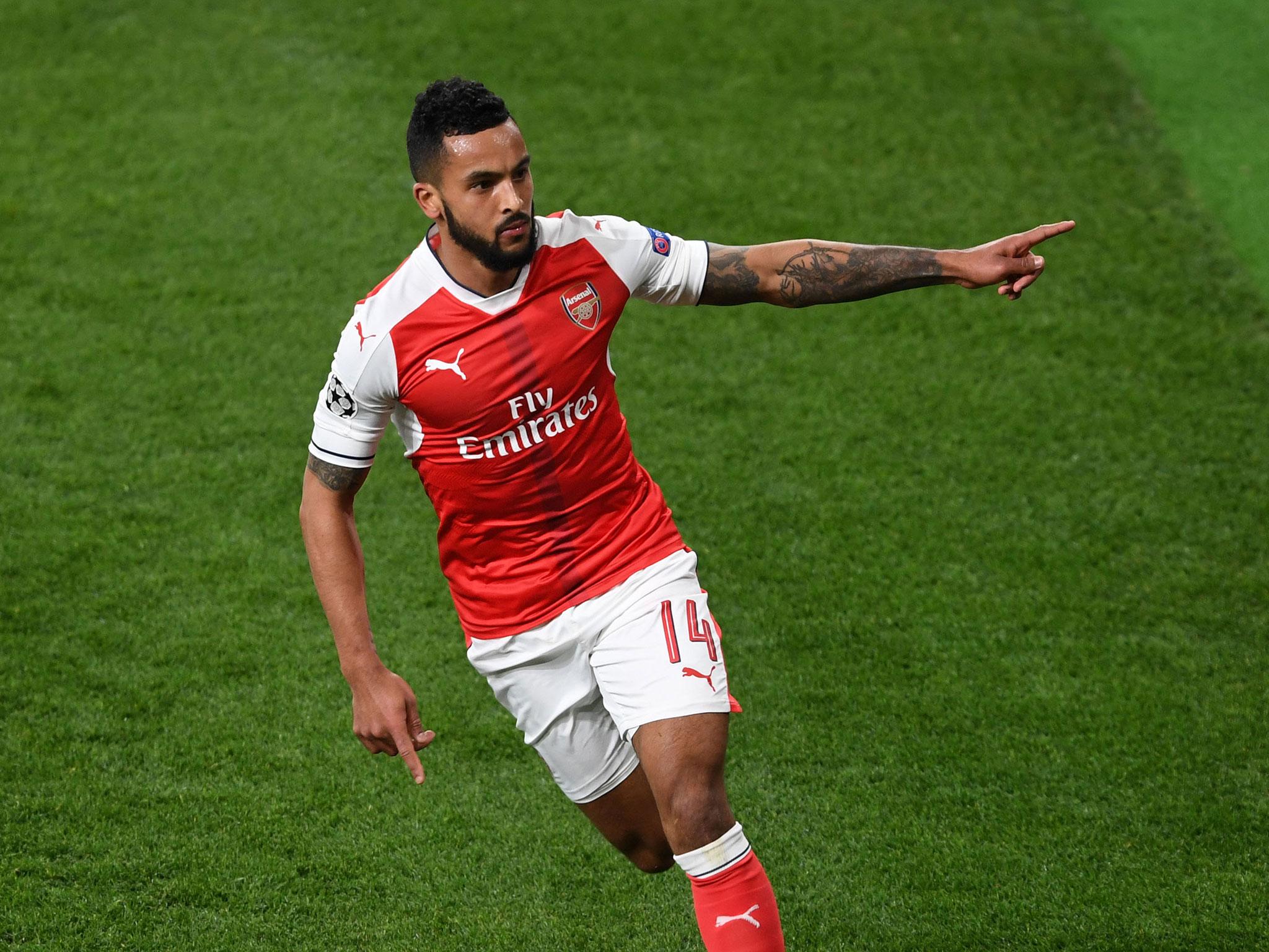 Theo Walcott has called on his Arsenal teammates to stop the in-fighting