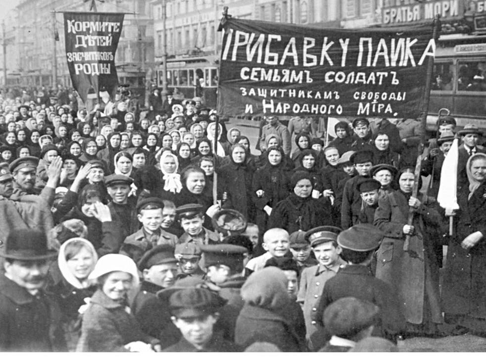 Mostly female workers marching in St Petersburg demanding the government 'feed the children of the defenders of the motherland'