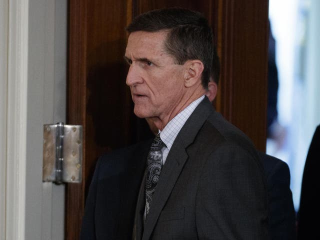Mike Flynn arrives for a news conference in the East Room of the White House in Washington