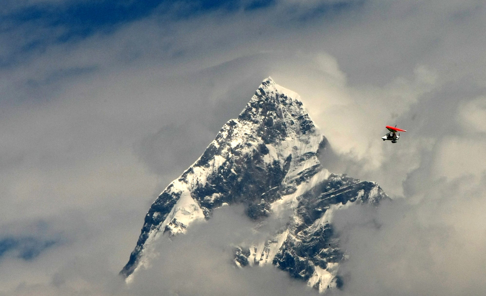 Get up early for a dawn flight to see the Himalayas in a prop plane (more robust than this one)