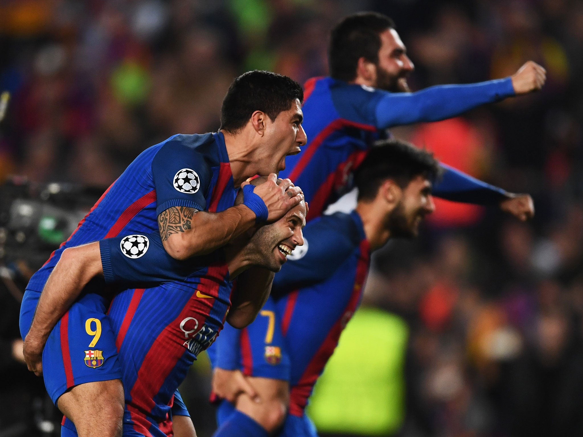 Barcelona's players celebrate after overcoming PSG to reach the last eight of the Champions League