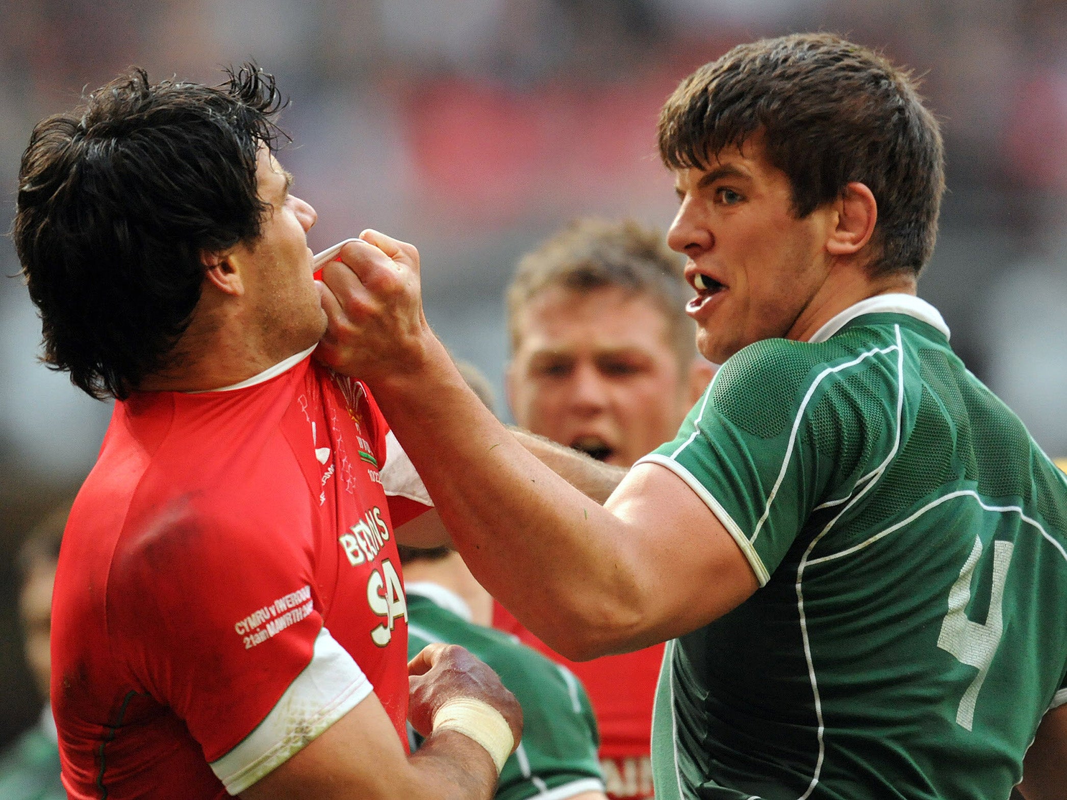 Mike Phillips clashes with Donncha O'Callaghan in the 2009 Six Nations