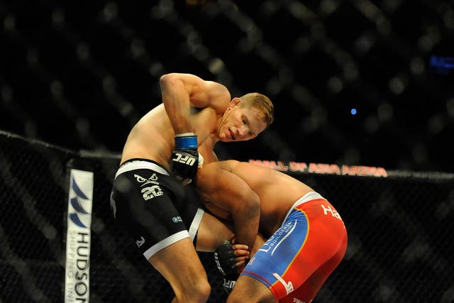 Luke Barnatt grapples with Mark Munoz during their bout at the UFC Fight Night in May 2015