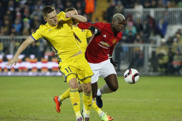 Manchester United's Paul Pogba battles for the ball in the opening stages