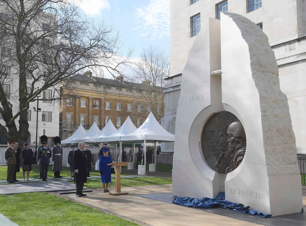 The Queen unveils a new memorial in London for those who served in the wars of Iraq and Afghanistan