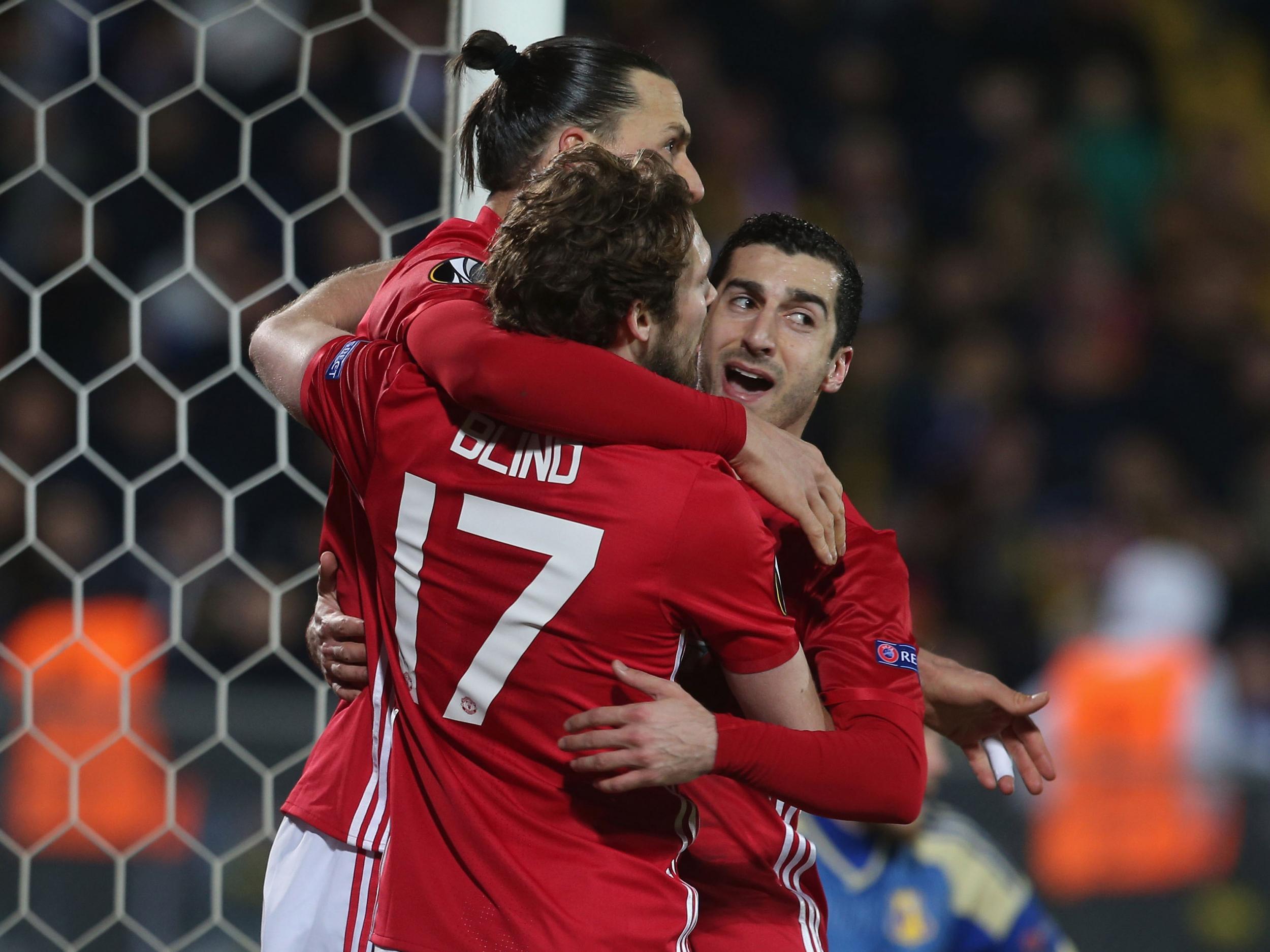 Mkhitaryan is congratulated after opening the scoring
